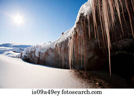 Icicles hanging from rock formation