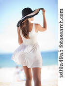 Woman walking on beach