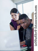 Business people working on laptop