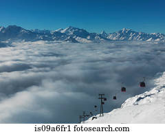 Ski lifts in ski resort with low cloud