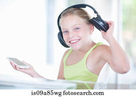 Girl listening to music on a smartphone