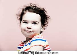 Portrait of baby girl wearing striped top