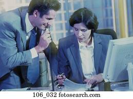 Business couple in discussion