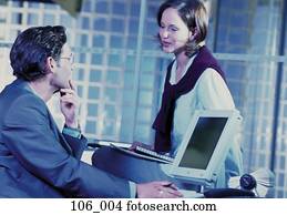 Business couple in office