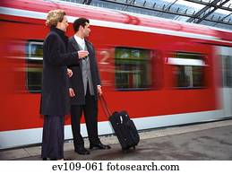 Business couple on platform