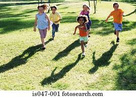 Children running in a park  
