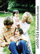 Parents playing with kids