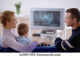 Family watching TV Family watching TV