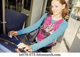 Girl withdrawing money