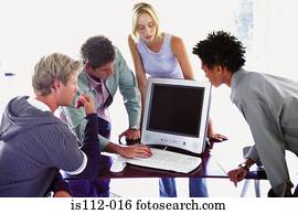 Men and woman using laptop computer