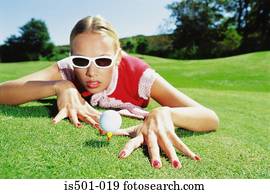 Woman playing golf