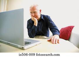 Man using laptop computer