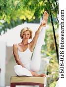 Woman doing yoga outdoors