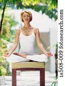 Woman doing yoga outdoors