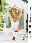 Woman doing yoga outdoors