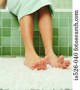 Feet getting out of the bath
