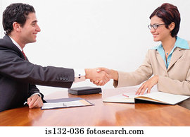 Man and woman shaking hands