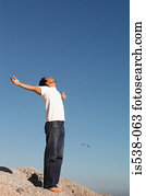 Man with his arms wide open