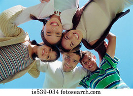 Family hugging in circle