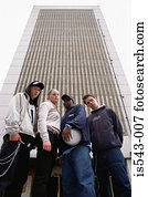 Teenagers outside multistorey building