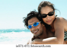 Couple hugging on beach