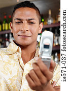 Man holding cellular telephone
