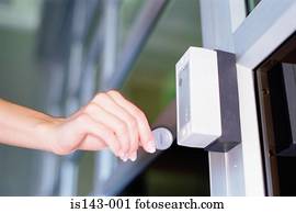 Female hand holds identity tag