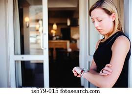 Young woman waiting outside