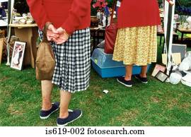 Senior women at boot fair Senior women at boot fair