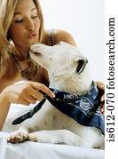 Lady owner with dog indoors