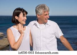 Mature couple by the sea