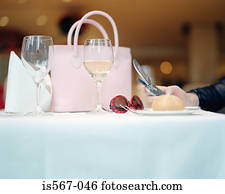 Feminine items on restaurant table