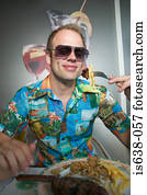 Man in sunglasses eating meal