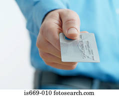 Man holding out credit card