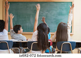 Schoolchildren with arms raised