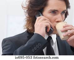 Businessman using a cellular telephone