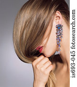 Woman covering face with hair