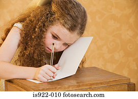 Girl writing a greetings card