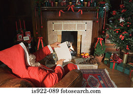 Santa claus reading a note