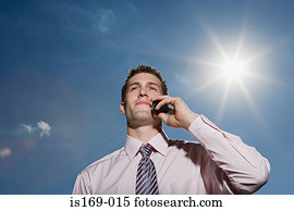 Businessman using a cellular telephone