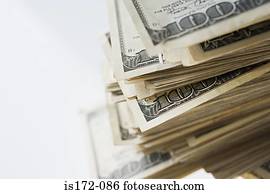 Pile of hundred dollar bills