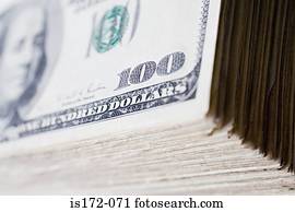 Stack of hundred dollar bills