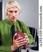 Man holding american football