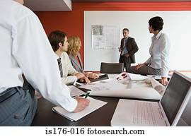 Businesspeople discussing plans