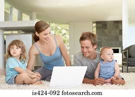Family using laptop computer