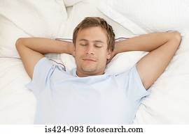 Mid adult man sleeping