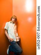 Teenage boy standing alone