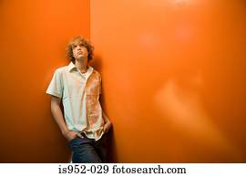 Teenage boy standing alone