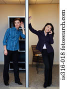 Woman listening in to a telephone call