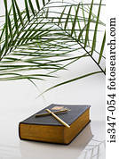 Palm leaf crucifix and bible
